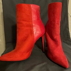Woman’s Red Heeled boots